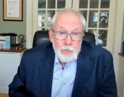 Bob joining an online World Economic Forum discussion from his office